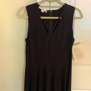 Elegant black little dress, size 10, flared skirt
